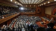 Lawmakers stand after dissolving the lower house of parliament in Tokyo, 23 January, 2026