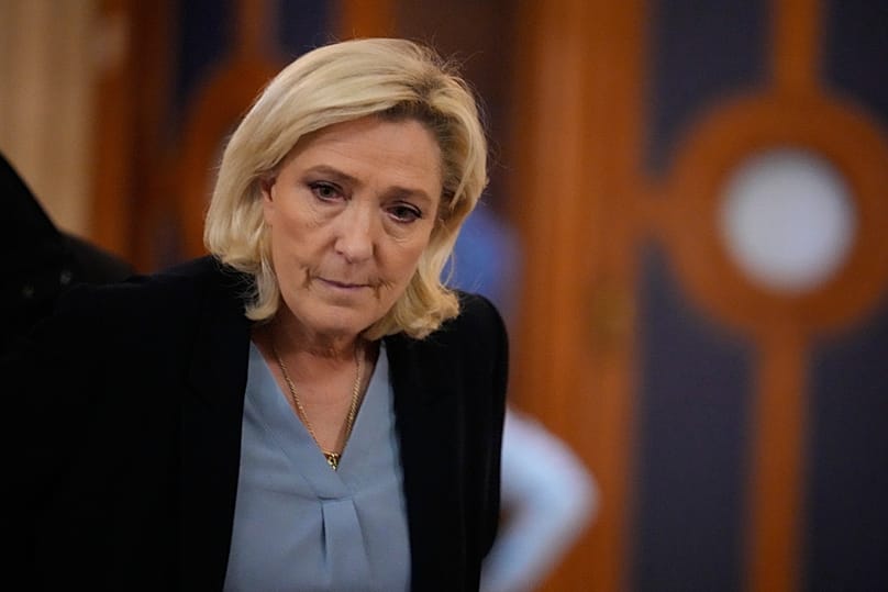 Far-right leader Marine Le Pen walks outside the courtroom during a short break in her appeals trial in Paris, 20 January, 2026