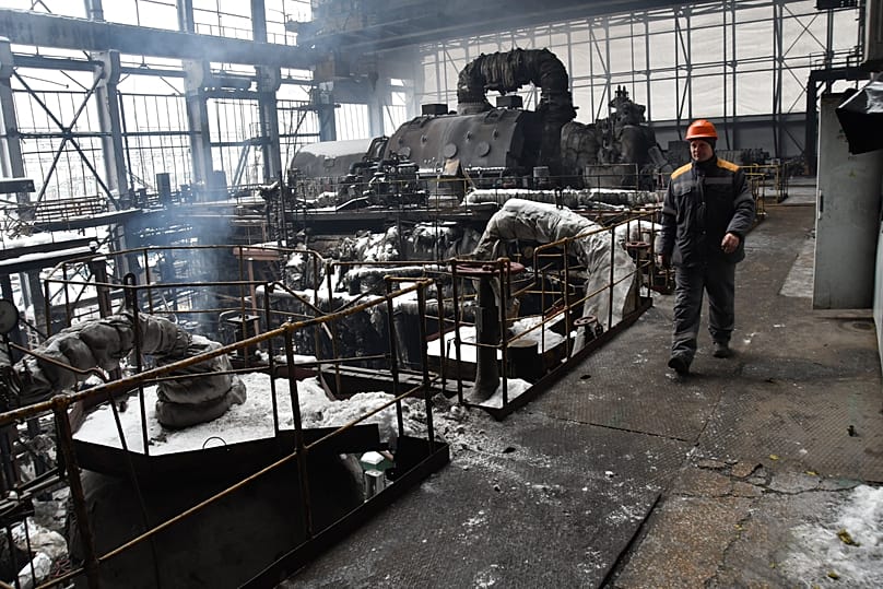 Workers repair a DTEK power plant after a Russian missile attack on the country's energy system in an undisclosed location in Ukraine, 23 January, 2026