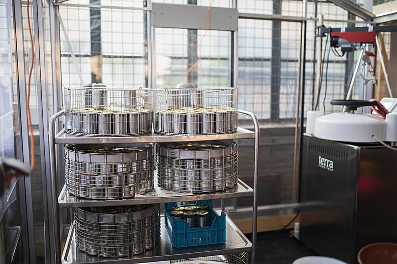 A stack of cans at the Mixblik food factory prior to being filled and labeled before being sold, Rotterdam, The Netherlands.