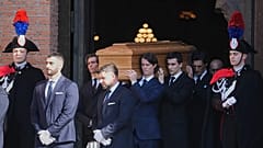The casket of fashion designer Valentino Garavani leaves the St. Mary of Angels Basilica in Rome, 23 January, 2026