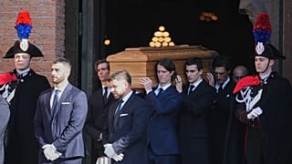 The casket of fashion designer Valentino Garavani leaves the St. Mary of Angels Basilica in Rome, 23 January, 2026