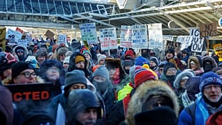 Clergy members and community activists gather at the Minneapolis-St. Paul International Airport on Friday, 23 January 2026.