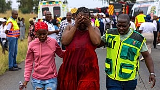 Families bid farewell to schoolchildren in South Africa killed in a school bus crash