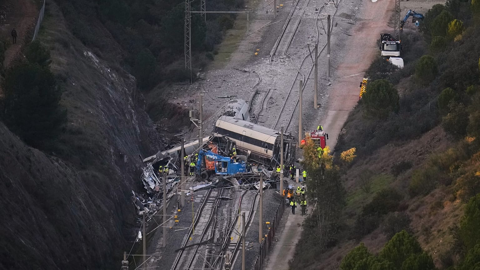 View of the site of a train collision in Adamuz, southern Spain, Tuesday, Jan. 20, 2026.