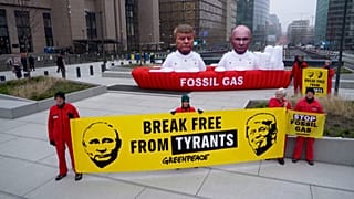 Greenpeace activists deployed balloons bearing the likenesses of Trump and Putin, warning the EU against dependence on fossil fuels, Brussels, Belgium, Jan. 26, 2026