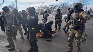 Protesters demonstrate against Immigration and Customs Enforcement (ICE) after Renee Good was fatally shot by an ICE officer last week, 12 January, 2026