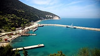 This April 14, 2015 photo shows a view of the small harbor on Sazan Island, 140 kilometers (85 miles) southwest of Albania's capital Tirana.
