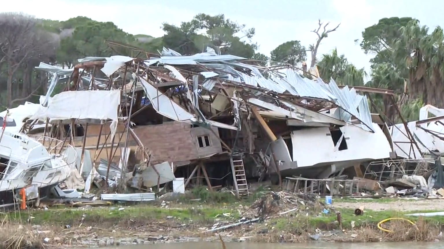 Several boats lie completely destroyed after a tornado formed over the Aksu River in Turkey, Jan. 26, 2026.