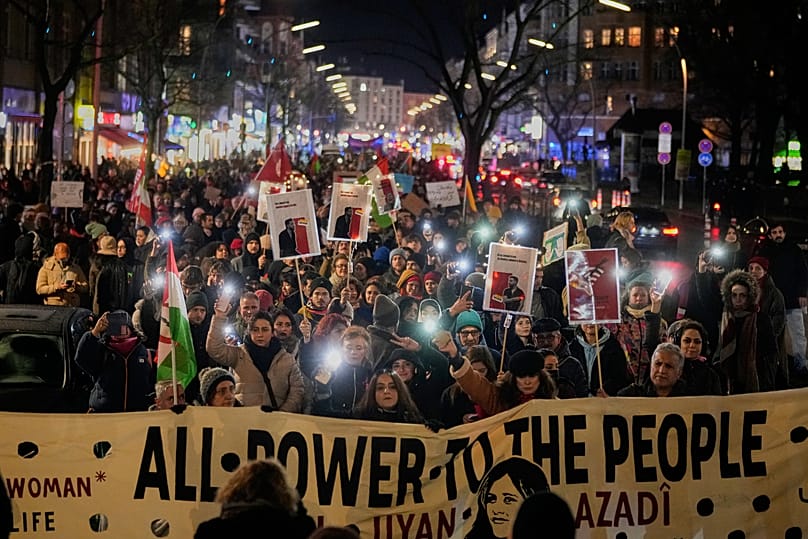 Protesters participate in a demonstration in in support of the nationwide mass protests in Iran against the government in Berlin, 14 January, 2026