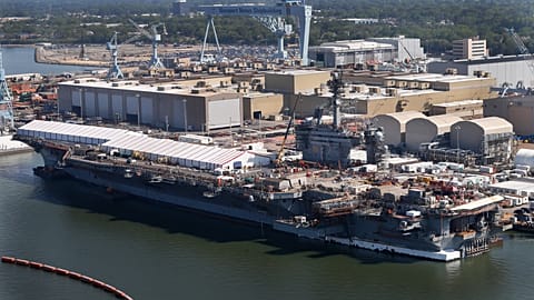 FILE - The nuclear powered aircraft carrier USS Abraham Lincoln sits pier side at Newport News Shipbuilding in Newport News, Va., Wednesday April 27, 2016