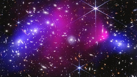 This NASA image shows two massive galaxy clusters previously captured by NASA's James Webb Space Telescope and Chandra X-ray Observatory.