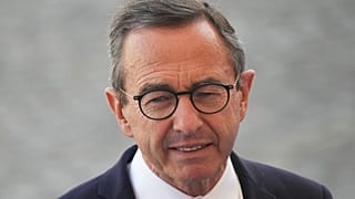 L'ex-ministre français de l'Intérieur Bruno Retailleau lors du défilé du 14 juillet, en 2025, à Paris. (AP Photo/Christophe Ena)