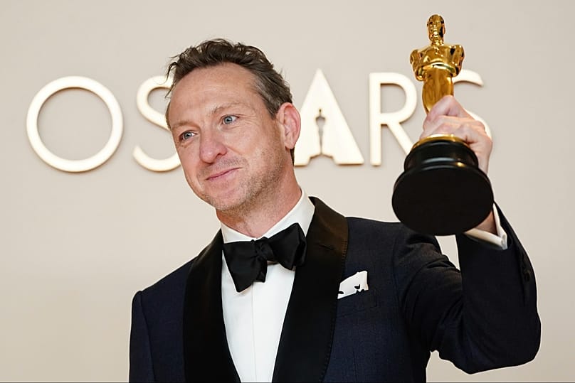 Lol Crawley, winner of the award for best cinematography for "The Brutalist," poses in the press room at the Oscars on Sunday, March 2, 2025, at the Dolby Theatre in Los Angel