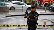 A member of Turkish security forces stands guard near a cordoned off area in Ankara, 1 October, 2023