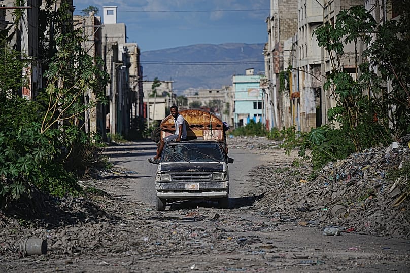 A local travels on public transportation through a gang-controlled area of Port-au-Prince, 19 January, 2026