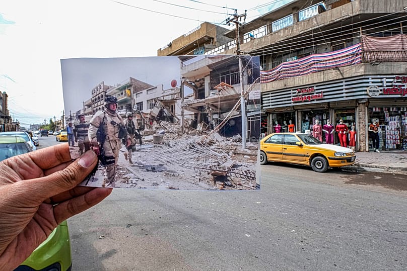 A photo of US troops in Baghdad in 2006 inserted into the scene at the same location, 21 March, 2023