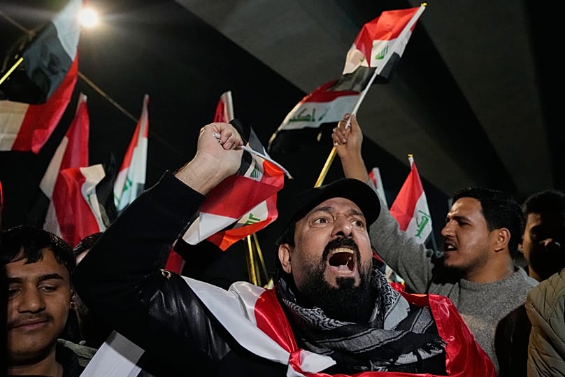 Protesters chant slogans during a protest against US President Donald Trump in Baghdad, 28 January, 2026