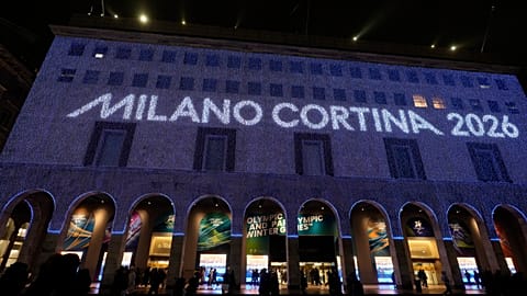 Olympic rings are projected on the facade of a building in front of the Duomo gothic cathedral, in Milan, Italy, Wednesday, Jan. 28, 2026. (AP Photo/Luca Bruno)
