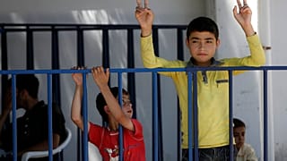  أطفال لاجئين سوريين في مخيم ألتينوزو، تركيا، الثلاثاء 21 يونيو 2011. 