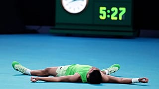 Carlos Alcaraz of Spain celebrates after defeating Alexander Zverev of Germany in their semifinal match at the Australian Open in Melbourne, Australia, Friday, Jan. 30, 2026