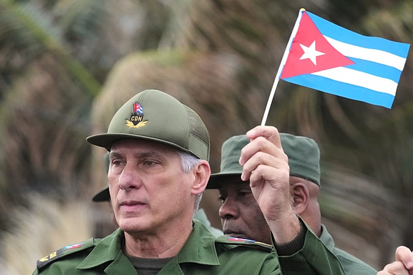 Cuban President Miguel Diaz-Canel protests the killing of Cuban officers during the US operation in Venezuela, outside the US Embassy in Havana, Cuba, Friday, Jan. 16, 2026