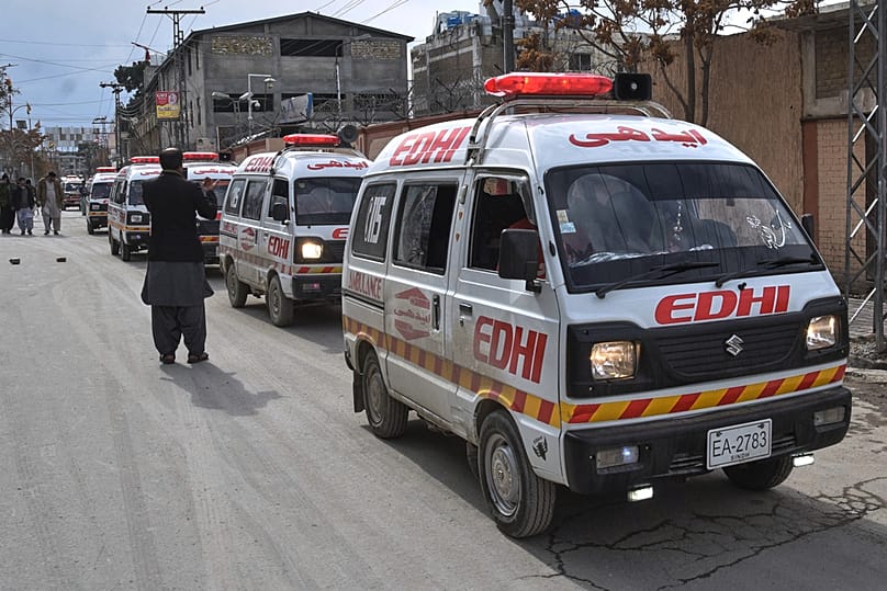 Ambulances carrying the bodies of police officers who were killed in a militants attack, outside a hospital in Quetta, Pakistan, Saturday, Jan. 31, 2026