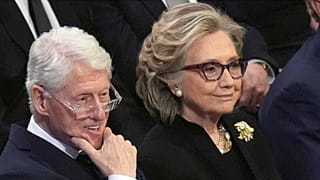 FILE - Former President Bill Clinton and former Secretary of State Hillary Clinton listen during a state funeral for former President Jimmy Carter, in Washington, Jan. 9, 2025
