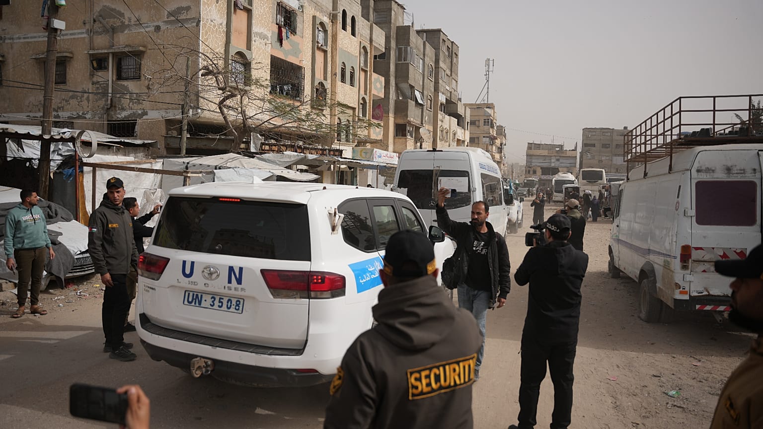 A U.N. vehicle escorts a bus carrying Palestinian patients in Khan Younis as they head to the Rafah crossing, leaving the Gaza Strip for medical treatment abroad, Monday, Feb.