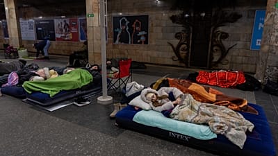People take shelter in a metro station, being used as a bomb shelter, during a Russian drones attack in Kyiv, Ukraine, Tuesday, Feb. 3, 2026