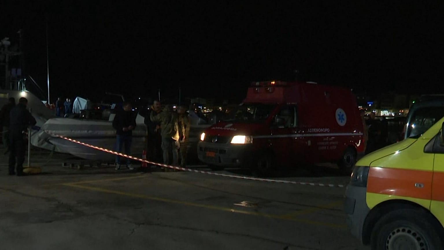 Emergency vehicles and ambulances parked at the port of Chios following a fatal collision between a patrol boat and speedboat carrying migrants, Feb. 4, 2026.