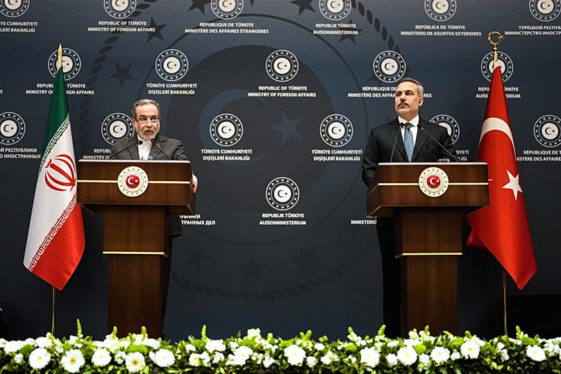 Turkish Foreign Minister Hakan Fidan, right, and his Iranian counterpart Abbas Araghchi hold a joint press conference in Istanbul, Turkey, Friday, Jan. 30, 2026