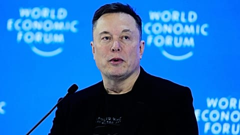 FILE - Elon Musk attends the Annual Meeting of the World Economic Forum in Davos, Switzerland. 22 Jan. 2026.