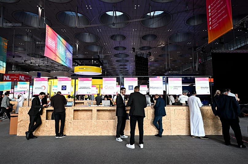 Alpha booths during the last day of Web Summit Qatar 2026