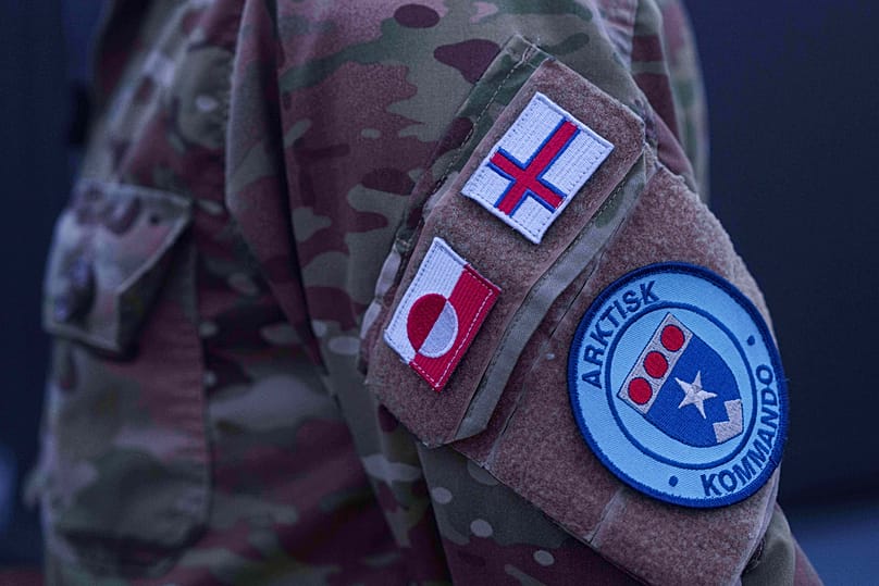A patch of the Joint Arctic Command is seen on Major General Søren Andersen standing onboard a Danish military vessel docked in Nuuk, Greenland, on 17 Jan 2026.