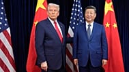 FILE - President Donald Trump, left, and Chinese President Xi Jinping pose ahead of their summit talk at Gimhae International Airport in Busan, South Korea, Oct. 30, 2025