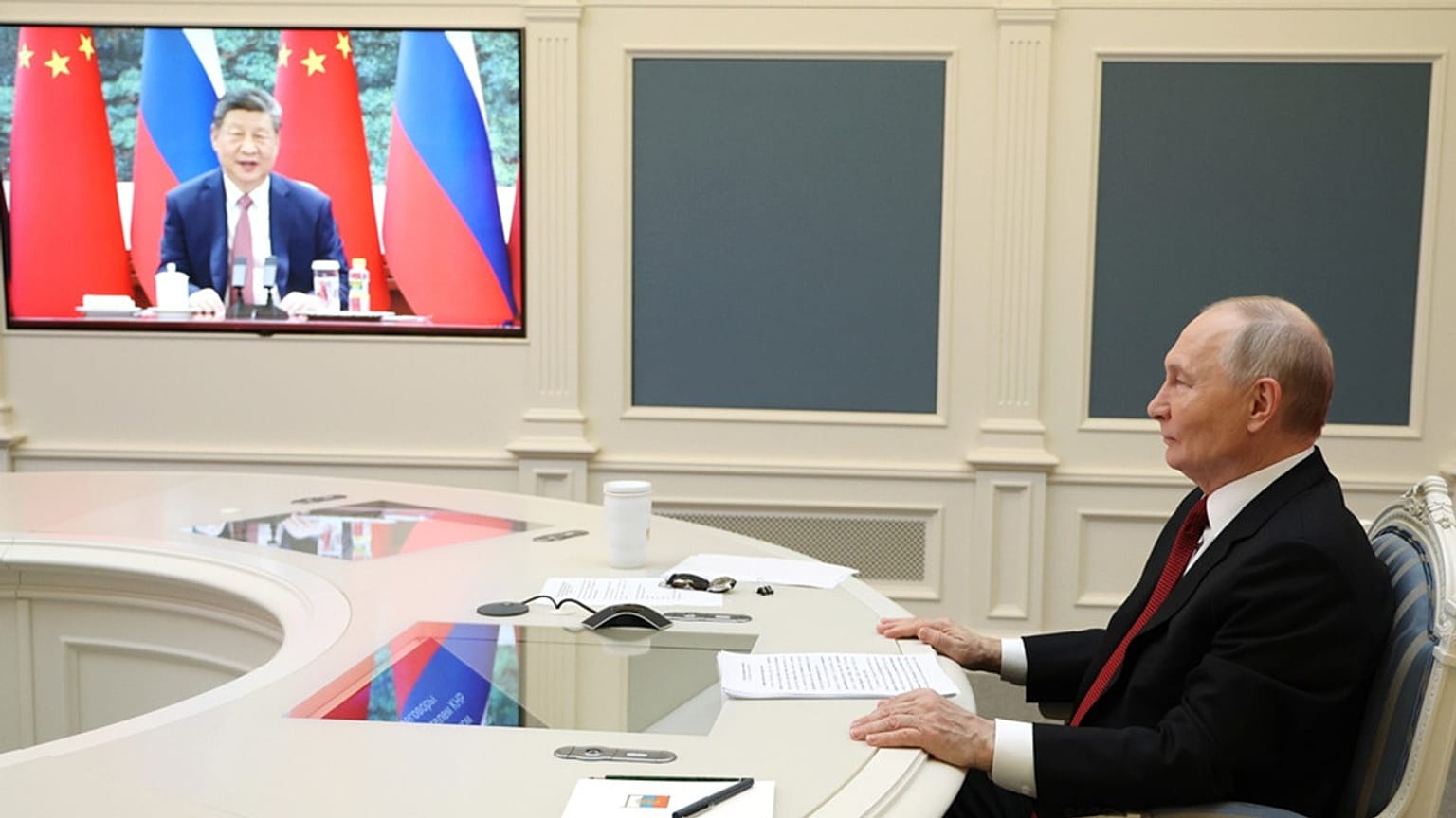 Russian President Vladimir Putin speaks with Chinese President Xi Jinping via videoconference at the Kremlin in Moscow, Wednesday, Feb. 4, 2026