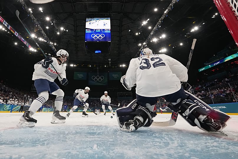 France's Alice Philbert makes a save during a preliminary round match of women's ice hockey between Italy and France at the 2026 Winter Olympics, in Milan, 5 February 2026