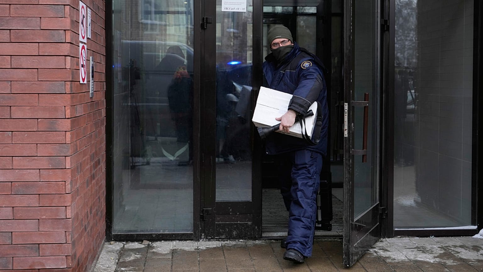An investigator leaves an apartment building where deputy chief of Russian military intelligence Lt Gen Vladimir Alekseyev was shot and wounded, in Moscow, 6 February 2026