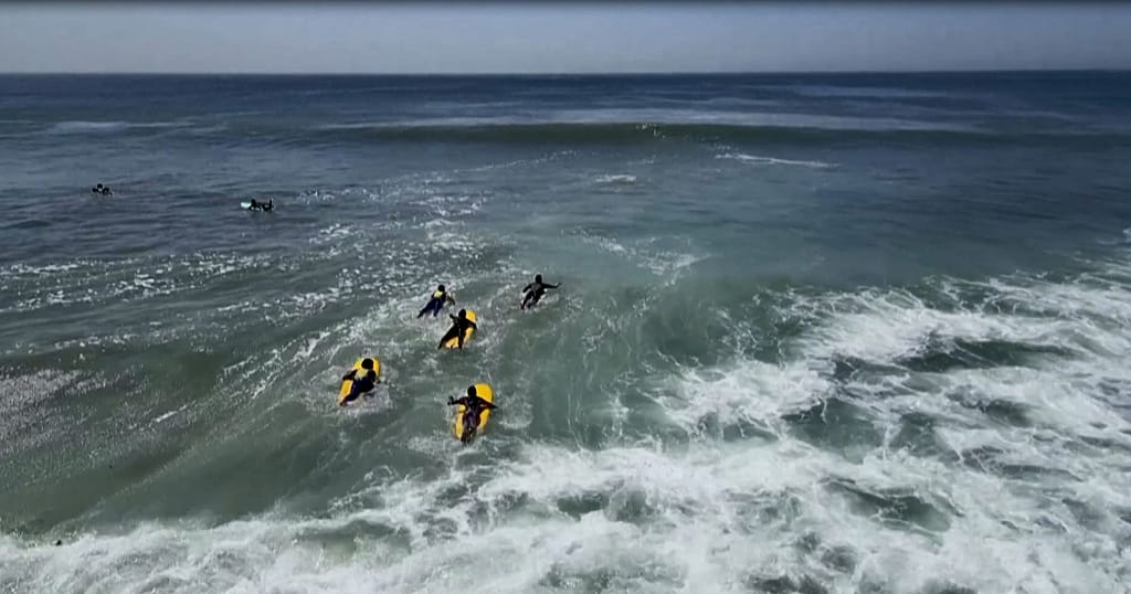 A surf academy is enticing Senegalese girls back to school