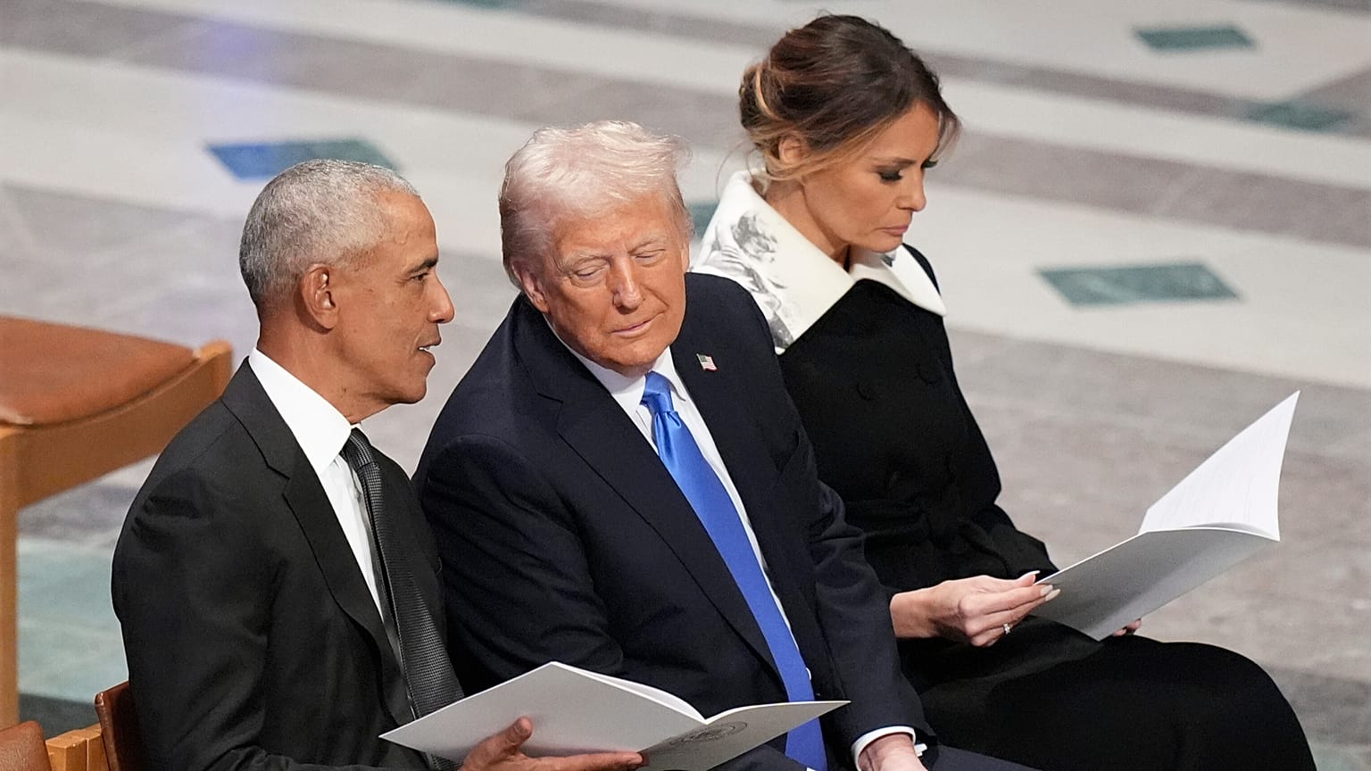 Former President Barack Obama talks with Donald Trump before the state funeral for former President Jimmy Carter at Washington National CathedralJan. 9, 2025. 