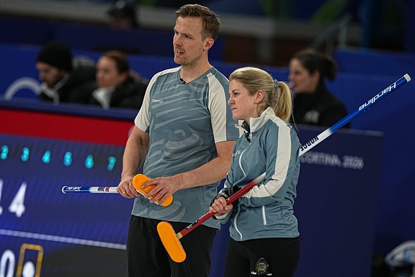 Norway's Magnus Nedregotten and Kristin Skaslien look on during the mixed doubles round robin at the 2026 Winter Olympics, in Cortina, 9 February 2026