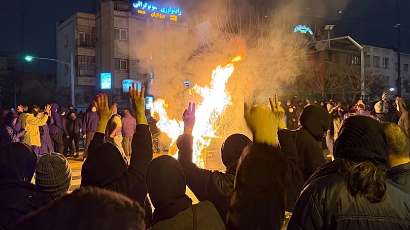 FILE - In this photo obtained by The Associated Press, Iranians attend an anti-government protest in Tehran, Iran, Friday, Jan. 9, 2026.