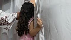 فتاة خلال قداس عيد الفصح في القاهرة، السبت 1 مايو 2021.