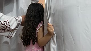 فتاة خلال قداس عيد الفصح في القاهرة، السبت 1 مايو 2021.