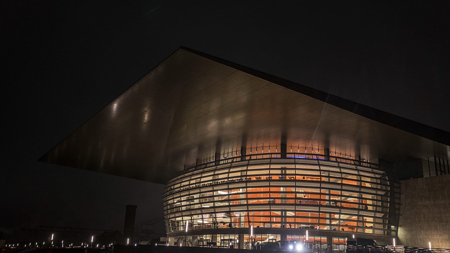 FILE: Copenhagen Opera house is illuminated Friday Feb. 2. 2018 as part of an outdoor lighting festival 