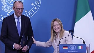Italian Premier Giorgia Meloni and German Chancellor Friedrich Merz attend a press conference at the end of an intergovernmental summit in Italy, 23 January 2026.
