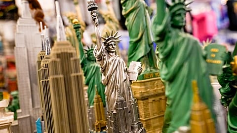 Souvenirs of the Statue of Liberty and the Empire State Building in a New York gift shop.
