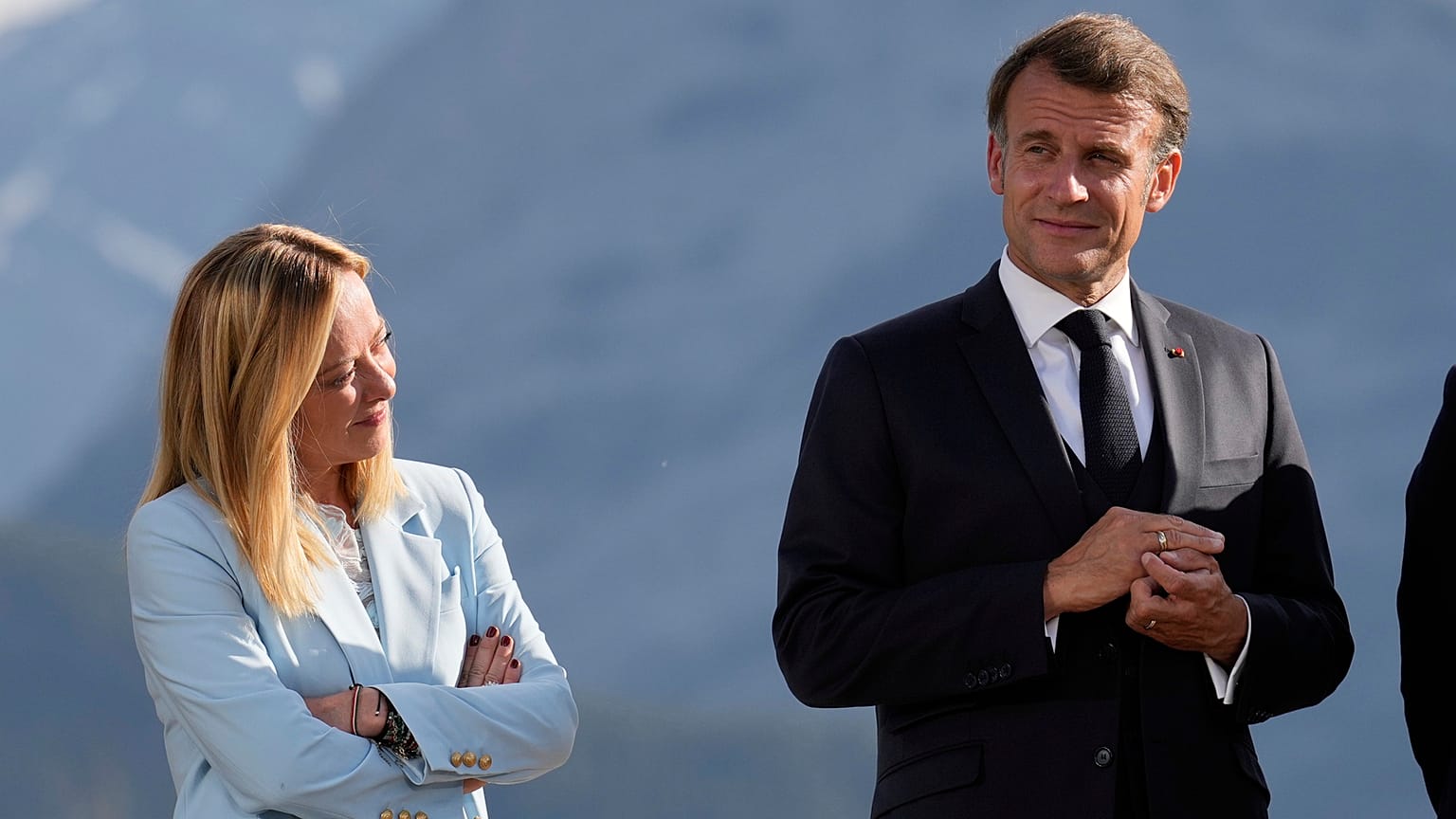 Italian Prime Minister Giorgia Meloni, left, and French President Emmanuel Macron, right