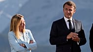 Italian Prime Minister Giorgia Meloni, left, and French President Emmanuel Macron, right